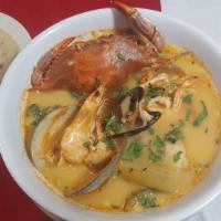 Sopa De Mariscos Con Crema · Seafood soup . Shrimps, squid, fish fillet, mussels, clam, and blue crabs.
