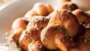 Garlic Knots · Hand-knotted pizza dough tossed with sicilian extra-virgin olive oil, fresh garlic, and peco...