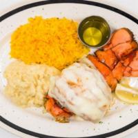 Two 6Oz Lobster Tail · Drawn butter, seasonal vegetables and saffron rice