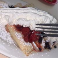 #31 Stuffed Berry Berry Crepes · Three Delicious crepes stuffed with strawberry cream cheese & topped with strawberries