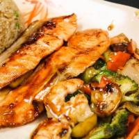 Salmon Hibachi · Served with clear mushroom soup , grilled vegetables, noodles,  you choice fried rice or ste...