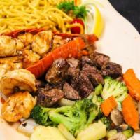 Filet Mignon & Lobster Tail Hibachi · Served with clear mushroom soup , grilled vegetables, noodles,  you choice fried rice or ste...