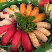 Fancy Tray Comb · 12Pcs assorted sushi ,18Pcs assorted sashimi,Sioux Falls Roll and Spicy Girl Roll.
