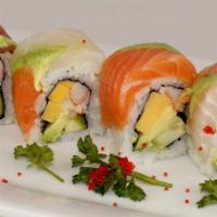 Rainbow Roll · Inside: crab meat stick, avocado, cucumber, top: salmon, tuna, white fish and avocado.