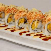 Angel Roll · Inside: shrimp tempura, mango top: spicy crab, fish egg, crunch and chef's special sauce.
