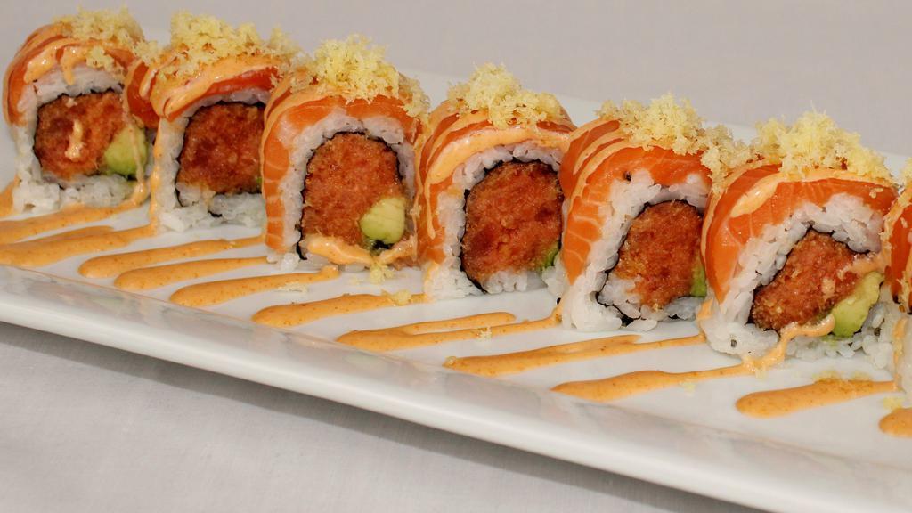 Tiger Roll · Inside: spicy tuna, avocado top: salmon fish egg, crunch and chef's special sauce.