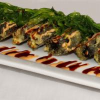 Omg Roll · Inside: spicy crab meat, white fish and avocado deep fried, top: seaweed salad, fish egg wit...