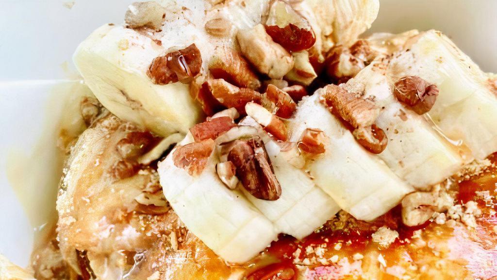 Grannys Pie · Cream cheese icing, thick rich caramel, graham cracker, bananas, sprinkled with pecans.