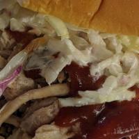 Pulled Pork · Our smoked pulled pork is cooked slow and low served in its juicy goodness with your choice ...