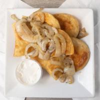 Pittsburgh Pierogies · Potato and cheese pierogies sautéed with butter and onions served with sour cream.