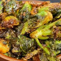 Brussel Sprouts · Flash fried and tossed in a spicy chili sauce. (GF)(VG)