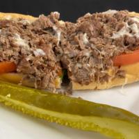 Philly Cheesesteak · Sliced ribeye on an italian sub roll with your choice of cheese and toppings.