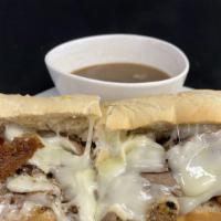 French Dip · Sliced roast beef, swiss cheese on a toasted torpedo roll. Served with au jus.