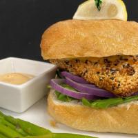 Sesame Crusted Salmon Sandwich · Grilled salmon fillet, spinach, red onion, spicy aioli on a ciabatta roll.