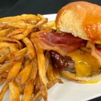Hickory Burger · Half pound black angus beef burger, cheddar cheese, bacon and BBQ sauce.