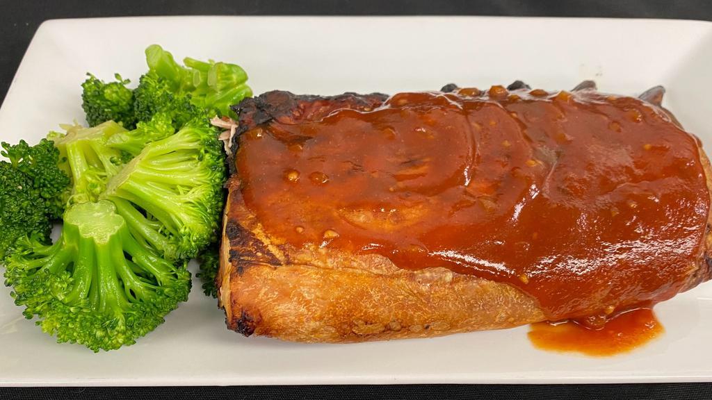 St Louis Style Bbq Pork Ribs · Slow cooked, fall off the bone BBQ ribs. Served with choice of 2 sides and a side house or caesar salad. (GF)