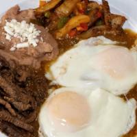 Huevos Rancheros · 2 eggs topped with green salsa served with refried beans, fresh white cheese and breakfast p...