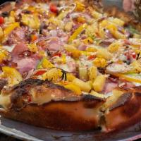 Lolo Wahine Hawaiian (Double Stack Deep Dish) · Three Cheese Blend, Ham, Bacon, Pineapple, Tomatoes, Sweet Bell Peppers and Sweet Onions wit...
