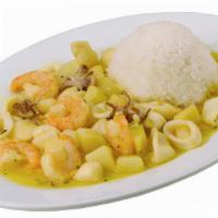 Cau Cau De Marisco · Shrimp, fish, squid, and potatoes in mild spicy turmeric sauce. Served with steamed garlic.