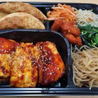 Tofu Dosirak 두부도시락 · Comes with rice, kimchi, and dumplings 2 pieces, cucumber kimchi, japchae, yellow daikon, co...