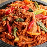 Jeyuk Bokkeum 제육볶음 · Stir-fried spicy pork. comes with steamed rice.