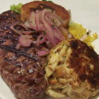 Ny Strip & Crab Cake · Center cut NY strip steak, with our jumbo lump crab cake, served with grilled stuffed potato...