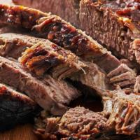 Sliced Beef Brisket · Angus Beef Brisket (6oz) smoked slow and low, sliced, and served with two sides.