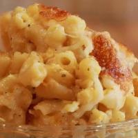 Mac & Cheese - Large Mac And Cheese · Blend of four cheeses, noodles, and specialized seasonings baked to buttery, cheesy goodness