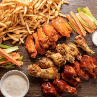 12 Bone-In Wings · 12 bone-in wings, served with veggie sticks and side of ranch or blue cheese.