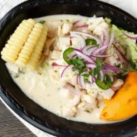 Ceviche · Fresh tuna prepared with limes, onions, spicy peppers, cilantro, marinated with lime juice a...