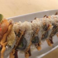 Godzilla Roll · Shrimp tempura, cream cheese, spicy crab meat, avocado, topped with tempura crunch, eel sauc...