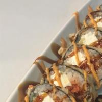 Rock 'N Roll · Spicy tuna, avocado, crab meat, cream cheese, fresh fried, topped with spicy mayo and eel sa...