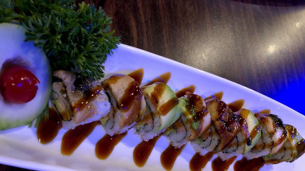 Dragon Roll · Shrimp tempura, avocado topped with bbq eel, eel sauce and spicy mayo.