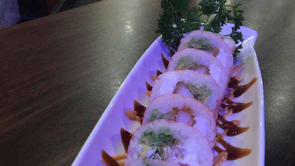 Pink Lady · Shrimp tempura, crab meat, cucumber, avocado, cream cheese, and masago, wrap in soy bean paper, topped with spicy mayo and eel sauce.