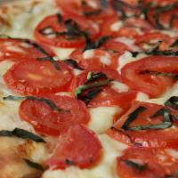 Napoli Pizza Large (X-Large) · Housemade roasted garlic sauce, mozzarella, roma tomatoes, Parmesan, fresh basil.