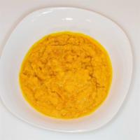 Split Pea Stew Yeater Kik Wet (የአተር ክክ ወጥ) · Curry split-peas sautéed with onion, garlic paste, and turmeric