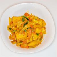 Cabbage And Potatoes Yatakilt (ያታክልት) · cabbage, potatoes, and carrots with onion, garlic paste and turmeric
