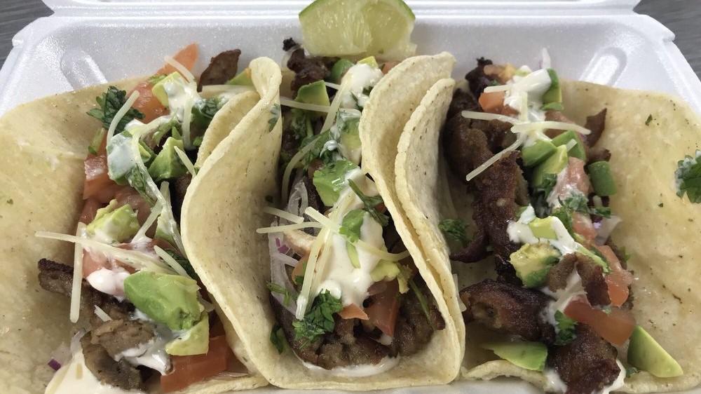 3 Pieces Lamb Taco · Gluten free. Prepared with cilantro, red onion, avocado, parmesan cheese, and special zone white sauce on a corn tortilla.