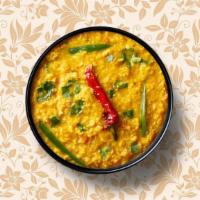 Tantalising Dal Tadka · A classic lentil soup made with the combination of yellow lentils and tomatoes tempered with...