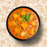 Cottage Cheese Peas Curry · Homemade Indian cheese cooked with tomato, ginger, and green peas in a creamy sauce. Served ...