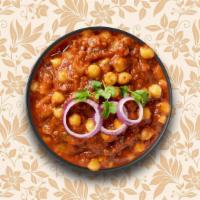 Special Garbanzo Gravy  · Garbanzo beans slow-cooked till soft in an onion-tomato-based curry sauce with Indian whole ...