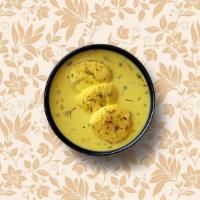 Classic Rasmalai · Fresh homemade cheese patties, steeped in a special condensed milk with pistachios.