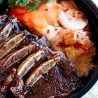 Korean Bbq · White or brown rice, grilled short ribs marinated in lemongrass with a side of kimchi.