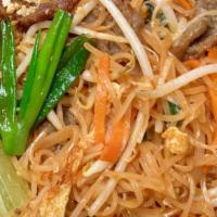 Pad Thai · Stir-fry rice noodle with fish sauce, bean sprouts, carrots, scallions, egg and PEANUTS.