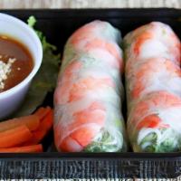 Spring Rolls (2) · Wrap in rice paper with noodles, lettuce, cucumber, and carrots.