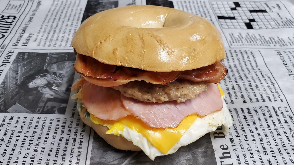Tj * · Canadian Bacon, Bacon, Sausage, Egg, American Cheese & Veggie Cream Cheese on your choice of bagels.