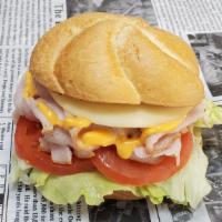 Georgetown · Freshly sliced turkey breast, provolone cheese, lettuce, tomato and russian dressing on a ka...