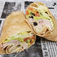 Turkey & Black Bean Wrap · Roasted turkey, black beans, lettuce, tomato, swiss cheese and avocado puree in a wheat tort...
