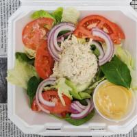 Chicken Salad Plate · Chicken salad lettuce tomato spinach & onion with your choice of dressing.