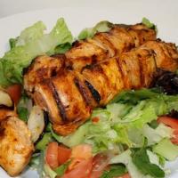 Chicken Salad · Grilled and marinated boneless chunks of chicken served with green salad, olive oil and bals...